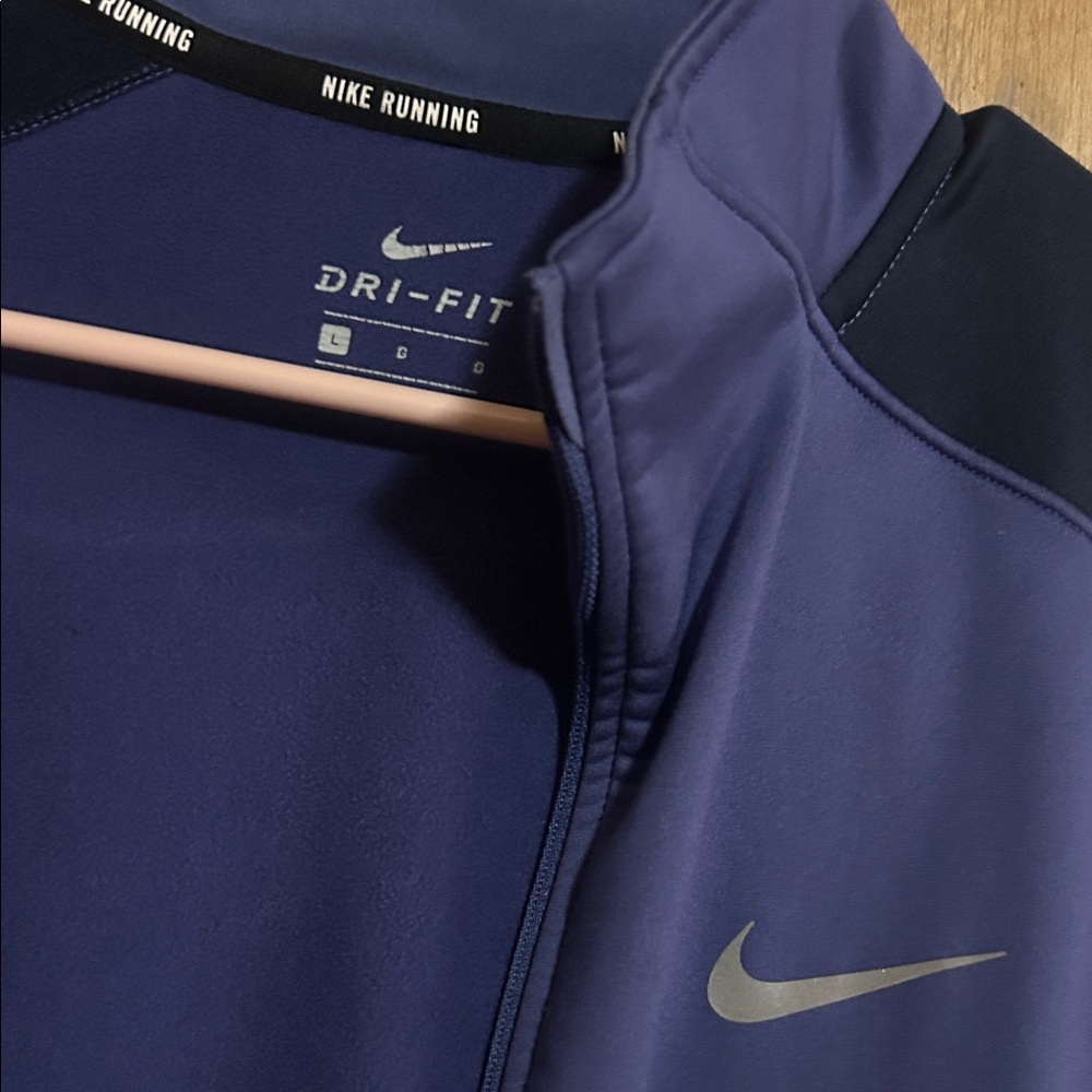 Nike Dri-FIT dark purple Running Jacket with thumb holes and zipper pockets